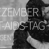 Ein P&auml;rchen k&uuml;sst sich im Schnee - zum welt-aids-tag-2016